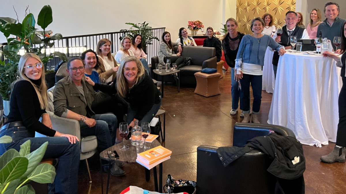Club Jam members gathered at an in-person AI event