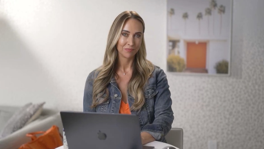 Robyn 'Jam' Anderson, founder of Club Jam, at her laptop